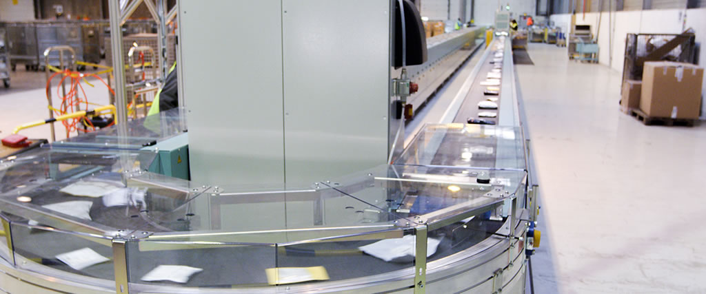 Solystic - Automatisation du tri colis - Tri des petits colis - CPS Vidage d'une sortie Solystic - Automatisation du tri colis - Tri des petits colis - CPS Vidage d'une sortie